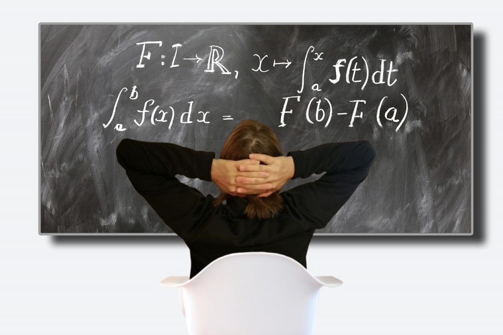 a woman staring at differential calculus